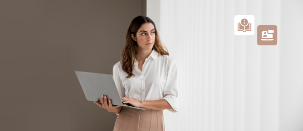 Candidate holding laptop preparing for multi-stage interview process
